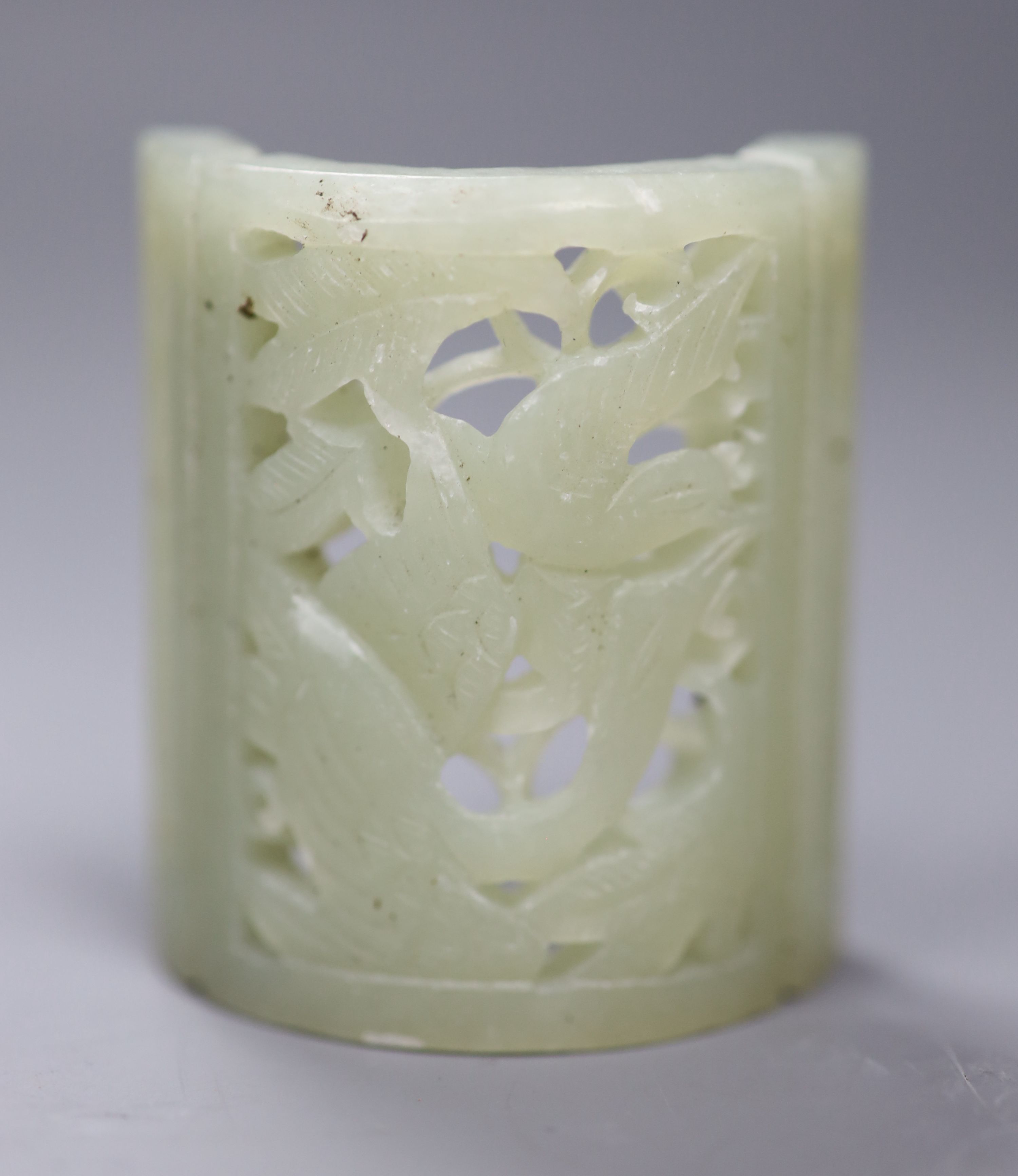 A Chinese bowenite jade camel and a curved plaque, largest 10cm